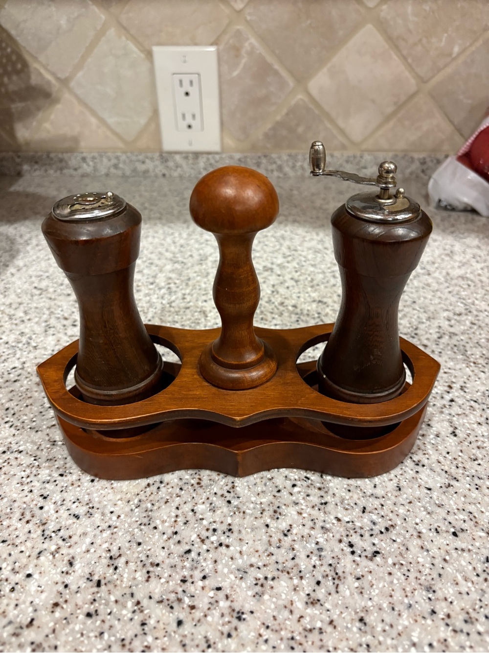 Vintage wooden salt and pepper set with a caddy